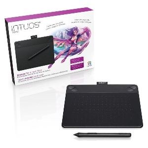 A tablet and pen tool sitting next to its box.