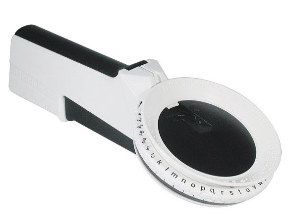 A handheld plastic device with a three inch dial for selecting letter and number characters